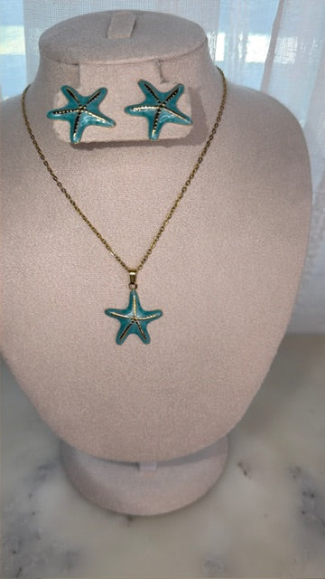 Teal colored Starfish necklace and earrings set on a mannequin bust with a neutral background