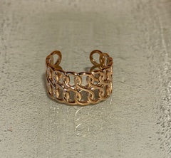 Rose Gold chain style double row open ring on a light gray background