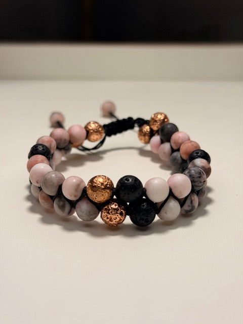 Multicolored beaded bracelet on a plain background